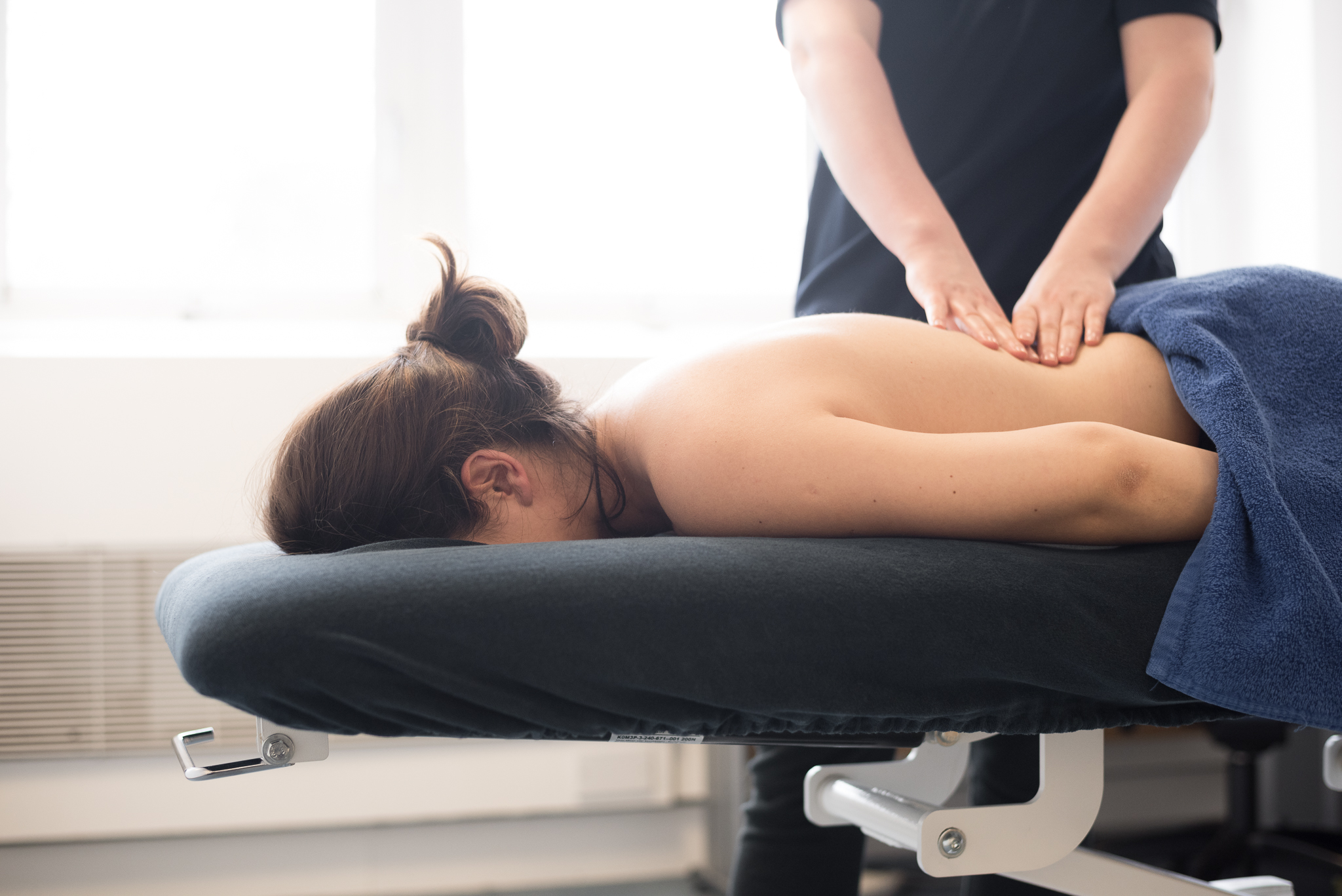 Benefits of Deep Tissue Massage for Upper Back Pain - One Body LDN